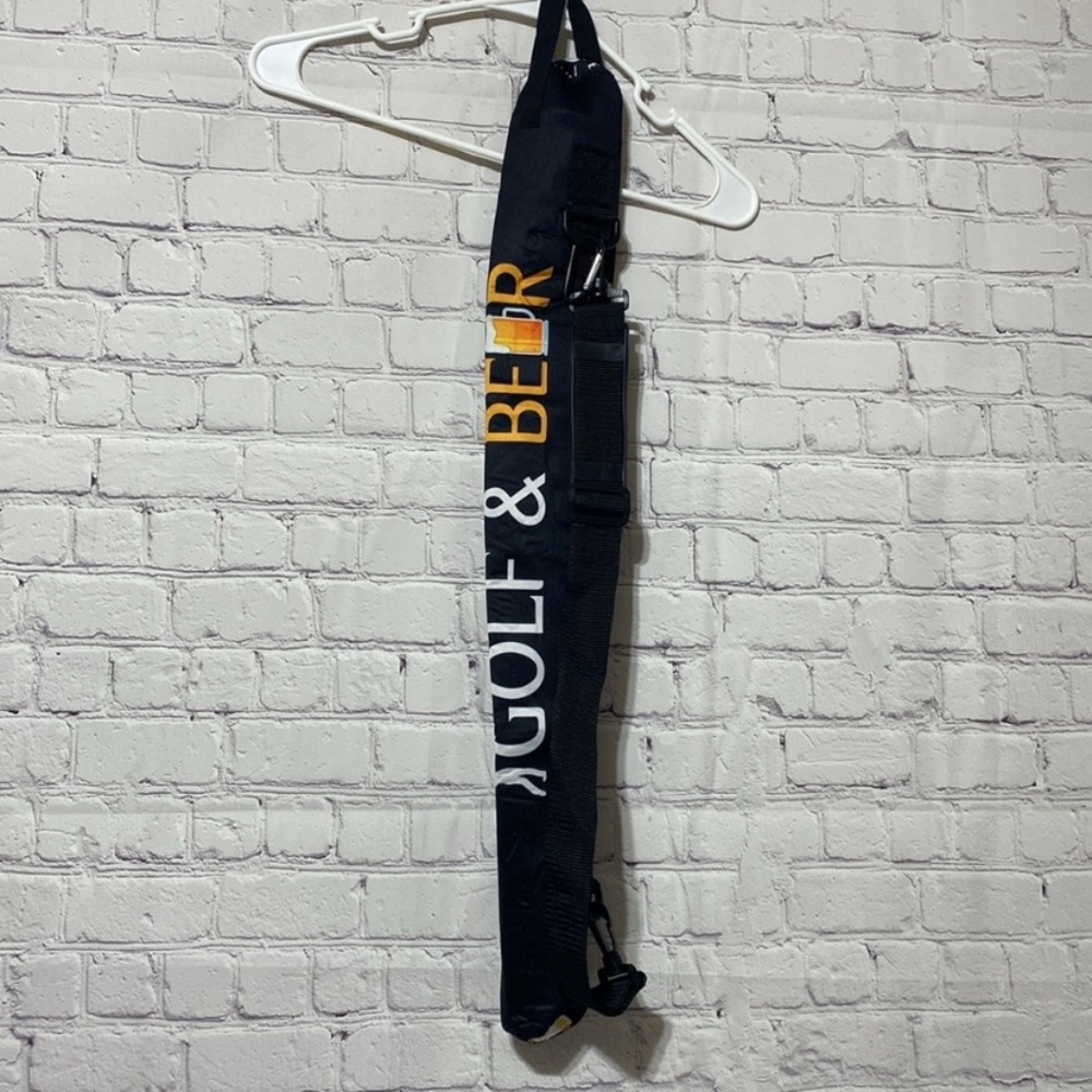 Black Golf Club Bag with White and Gold Text for beer